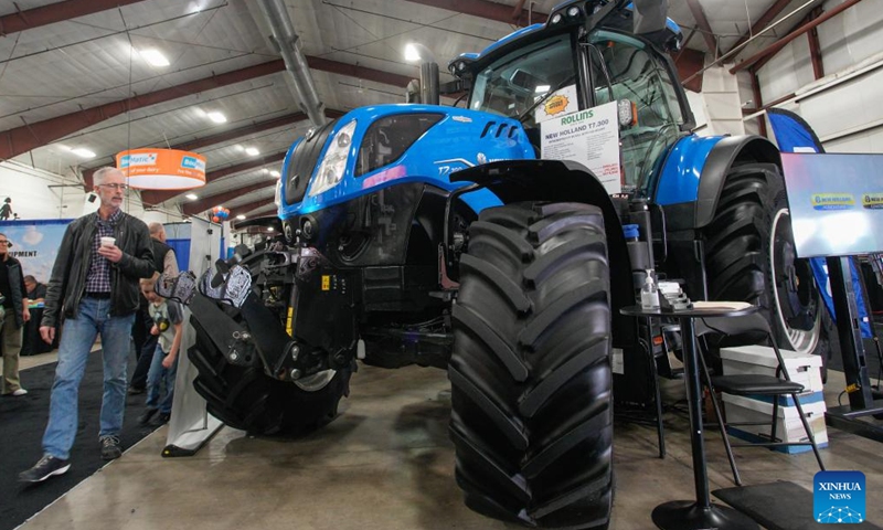 People view a tractor at the 2026 Pacific Agriculture Show in Abbotsford, British Columbia, Canada, Jan. 22, 2026. The event kicked off here on Thursday and runs until Jan. 24. (Photo by Liang Sen/Xinhua)