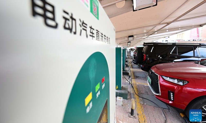 Electric vehicles charge at a charging station in Yinchuan City, northwest China's Ningxia Hui Autonomous Region, Jan. 21, 2026. China has built the world's largest electric vehicle (EV) charging network, which can meet the charging demand of more than 40 million new energy vehicles, the National Energy Administration (NEA) said on Wednesday. (Photo by Yuan Hongyan/Xinhua)

