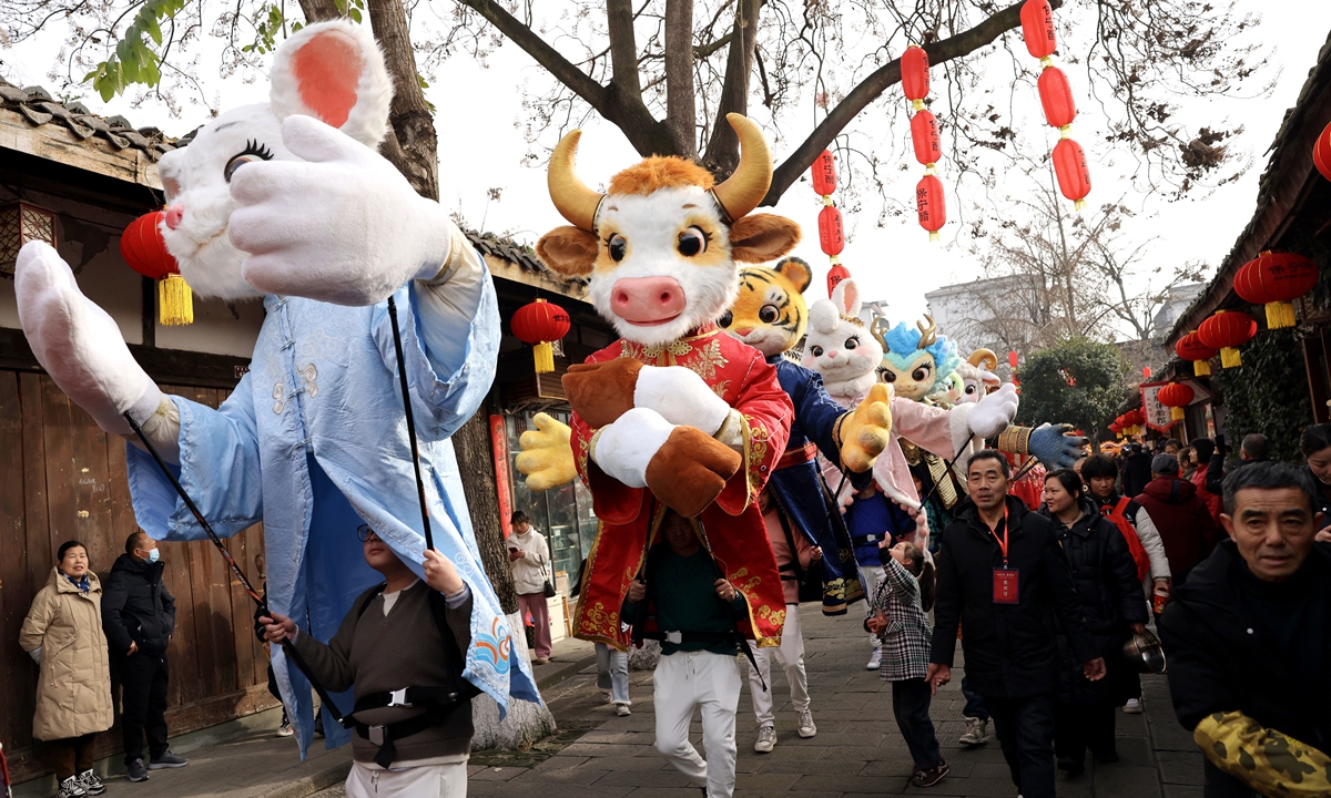 Performers in giant zodiac animal costumes parade through the ancient city of Langzhong, Southwest China's Sichuan Province, on January 26, 2026. The date marked the day of the Laba Festival, which falls on the eighth day of the 12th month of the traditional Chinese calendar and is considered a prelude to the Spring Festival, or Chinese New Year. It is customary to eat Laba porridge on this day. Photo: VCG
