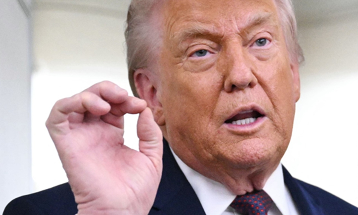 US President Donald Trump speaks to reporters while in flight on Air Force One, traveling from Shannon, Ireland en route Joint Base Andrews in Maryland on January 22, 2026. Trump is returning from Davos, Switzerland after attending the World Economic Forum. Photo: VCG