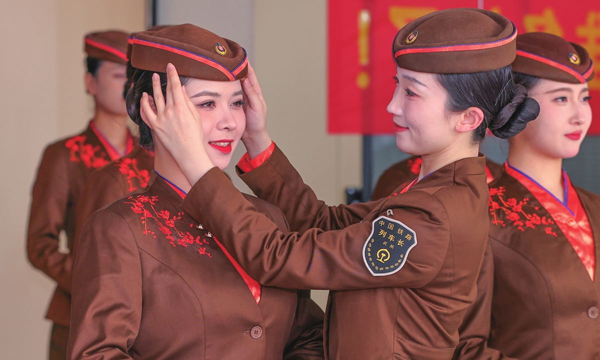 Train attendants participate in etiquette training for the upcoming Spring Festival travel season in Wuhan, Central China's Hubei Province, on January 28, 2026. Photo: VCG