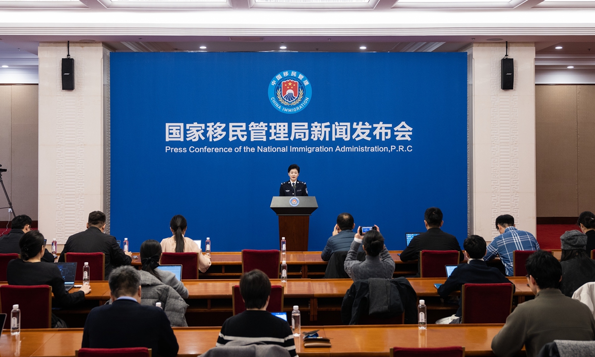 Lü Ning, a spokesperson for the National Immigration Administration (NIA), hosts a press conference on January 28, 2026, to present major statistics and achievements in China's immigration administration work in 2025. Photo: Courtesy of the NIA