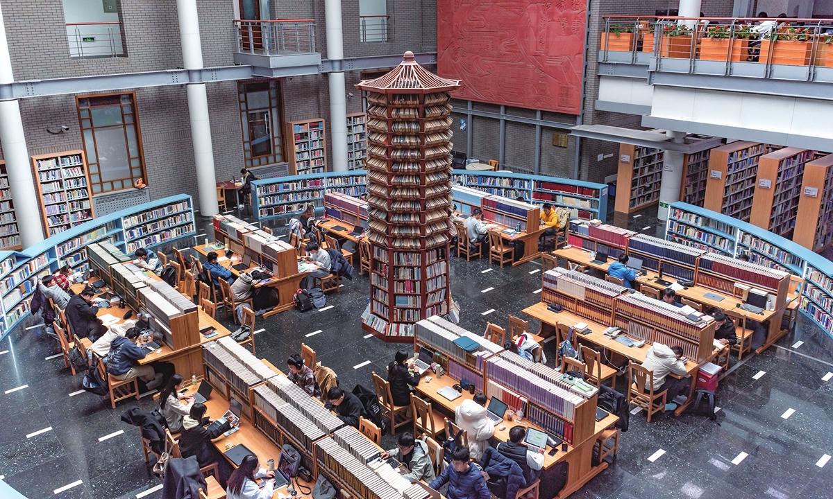 Students read in the Sunny Lobby at the Peking University Library in Beijing on October 23, 2025. Photo: VCG