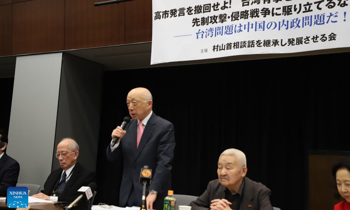 Takakage Fujita, the secretary-general of the Association for Inheriting and Propagating the Murayama Statement, reads out a statement demanding Takaichi withdraw her comments at a press conference in Tokyo, Japan, December 8, 2025. Photo: Xinhua