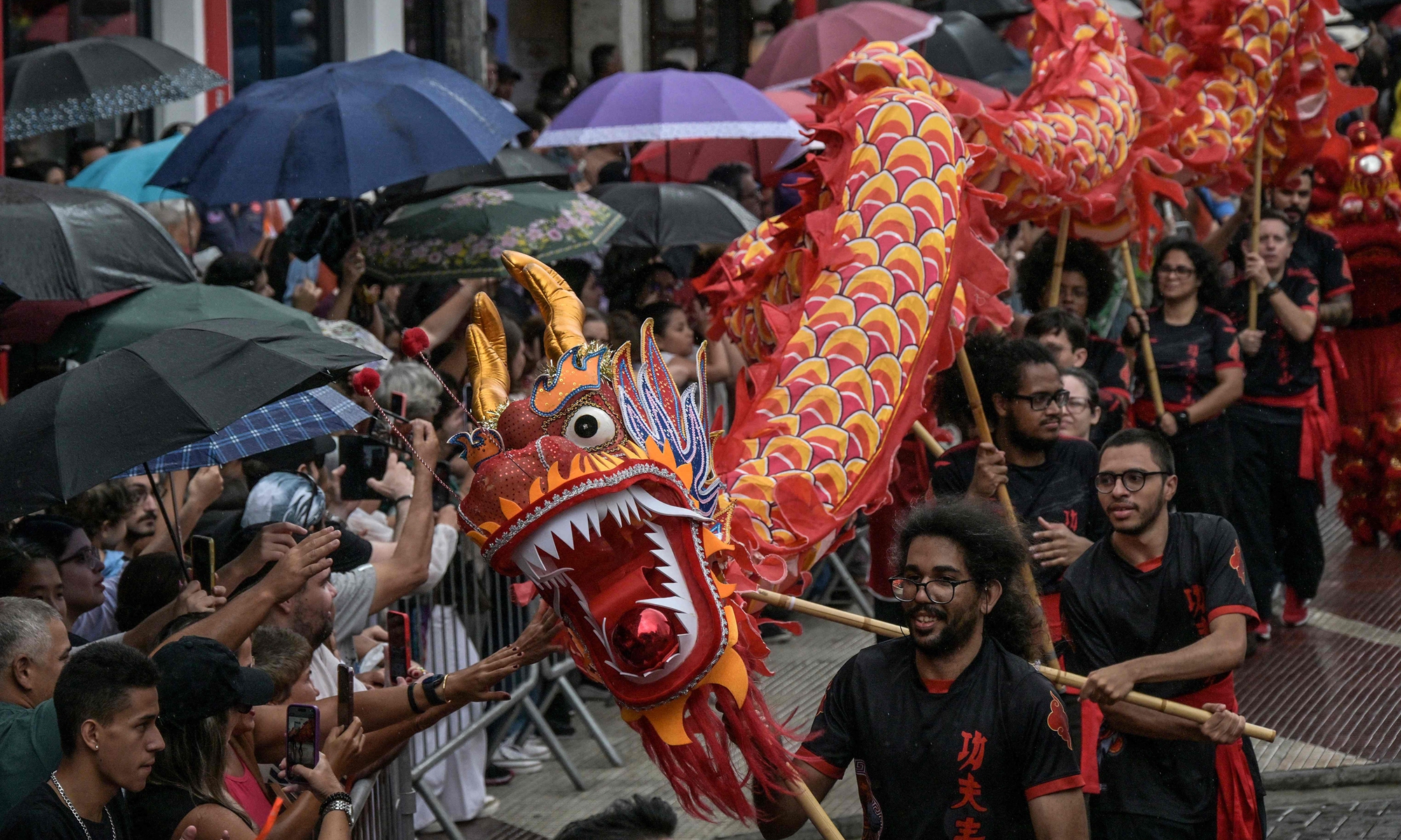 A dragon dance is performed during celebrations marking the Chinese New Year, which falls on February 17 and welcomes the Year of the Horse, in the Liberdade district of Sao Paulo, Brazil, on January 31, 2026. Photo: VCG