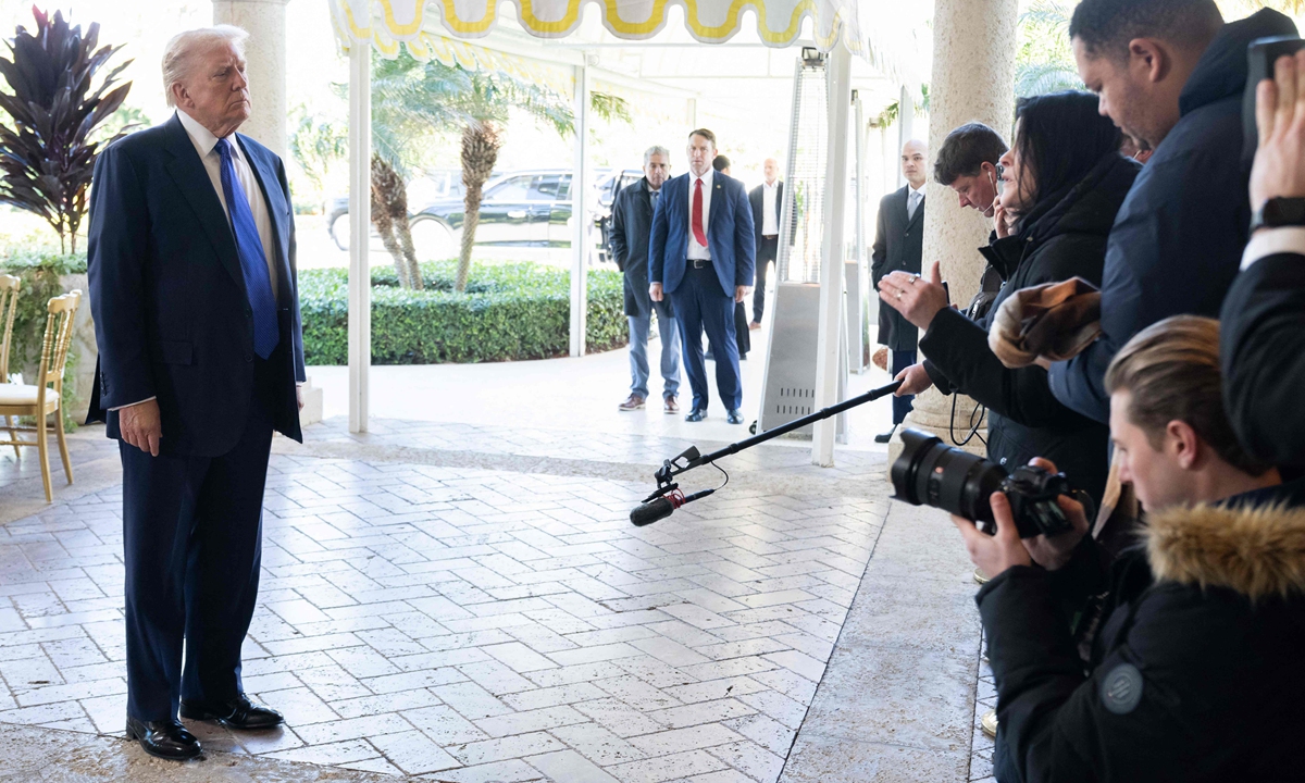 US President Donald Trump speaks to the press as he arrives at Mar-a-Lago in Palm Beach, Florida, on February 1, 2026. Photo: VCG