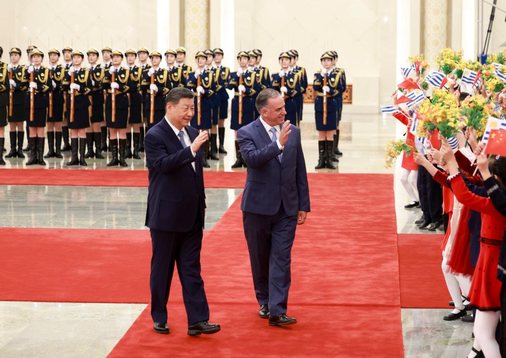 Chinese President Xi Jinping holds a welcome ceremony for President of the Oriental Republic of Uruguay Yamandu Orsi in the Northern Hall of the Great Hall of the People prior to their talks in Beijing, capital of China, Feb. 3, 2026. Xi held talks with Orsi, who is on a state visit to China, at the Great Hall of the People in Beijing on Tuesday. (Xinhua/Ding Haitao)