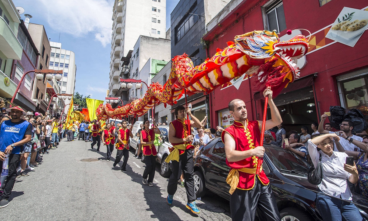 The dragon and lion dance is performed during the celebrations marking the Year of the Horse, the upcoming Chinese Lunar New Year, in Sao Paulo, Brazil, on January 31, 2026. Photo: VCG
