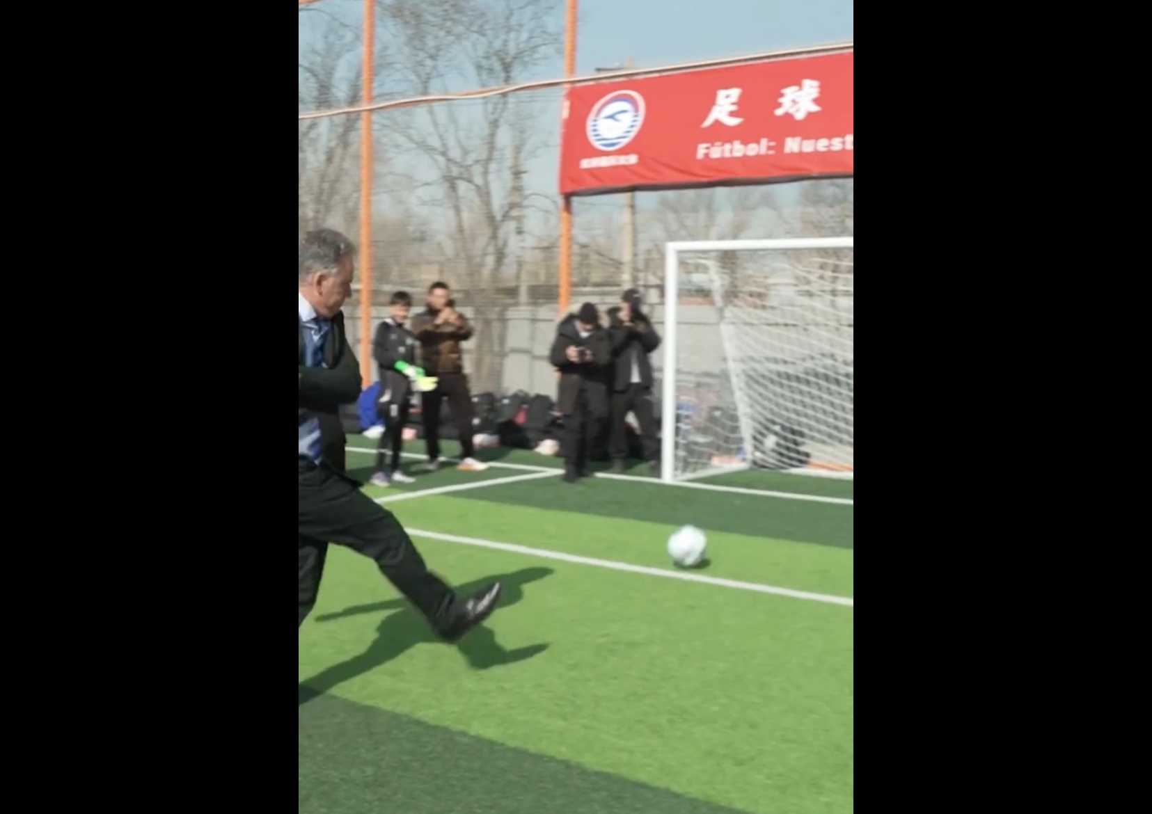 Uruguayan President Orsi takes shot with Chinese players at the China Rainbow International Football Club in Beijing on February 4. Photo: Screenshot from Orsi's Instagram account