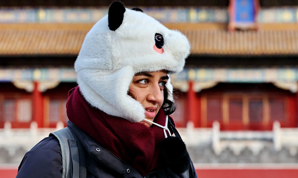 A foreign tourist wearing a cotton hat and scarf visits the Palace Museum, also known as the Forbidden City, in Beijing, on February 6, 2026. In 2025, Beijing's inbound tourism achieved remarkable growth, welcoming 5.48 million inbound visitors - a year-on-year increase of 39 percent - and generating tourism revenue of about 50 billion yuan ($7.2 billion). Photo: VCG