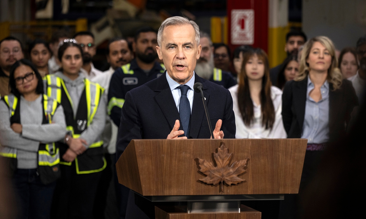 Canadian Prime Minister Mark Carney speaks to the press during an announcement while visiting an auto-parts plant in Woodbridge, Ontario, Canada on February 5, 2026. Photo: VCG