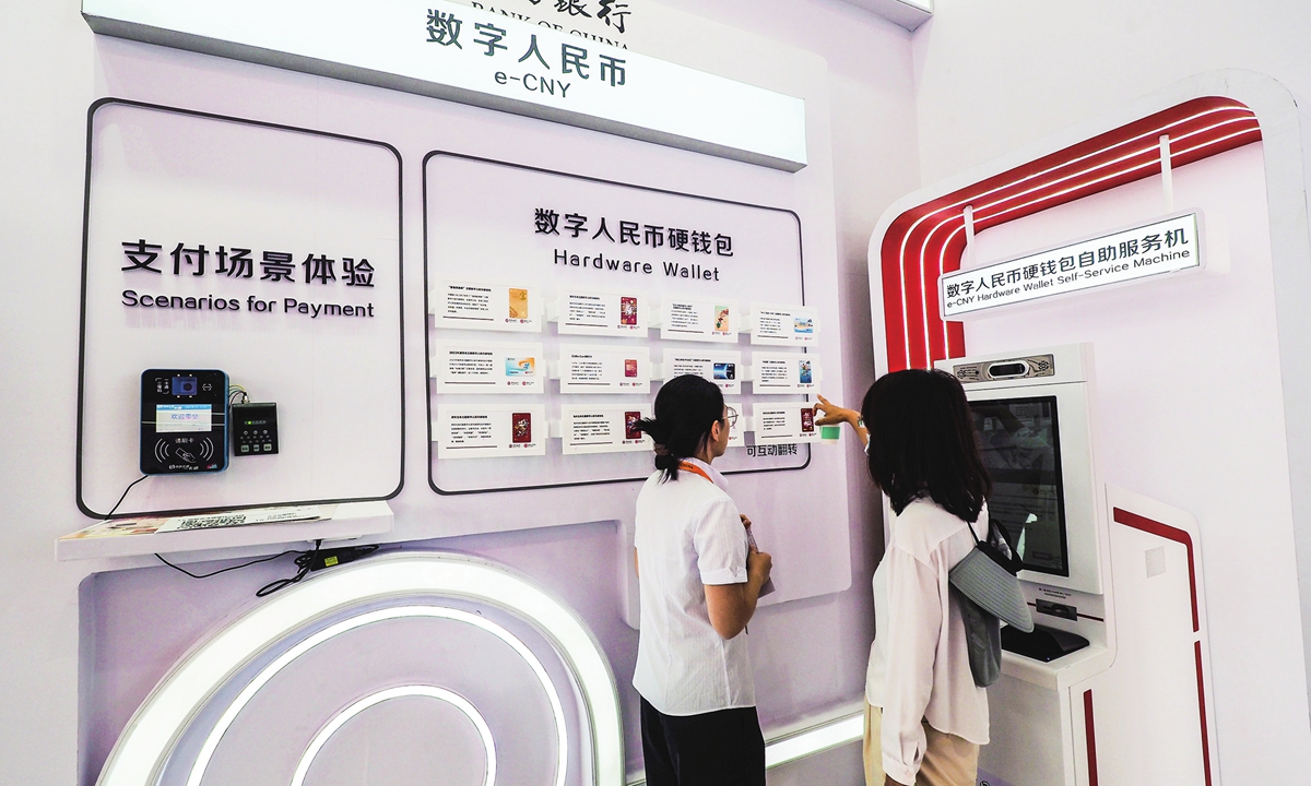 A visitor learns about the application of e-CNY at the 2025 China International Fair for Trade in Services (CIFTIS) in Beijing on September 13, 2025. Photo: VCG