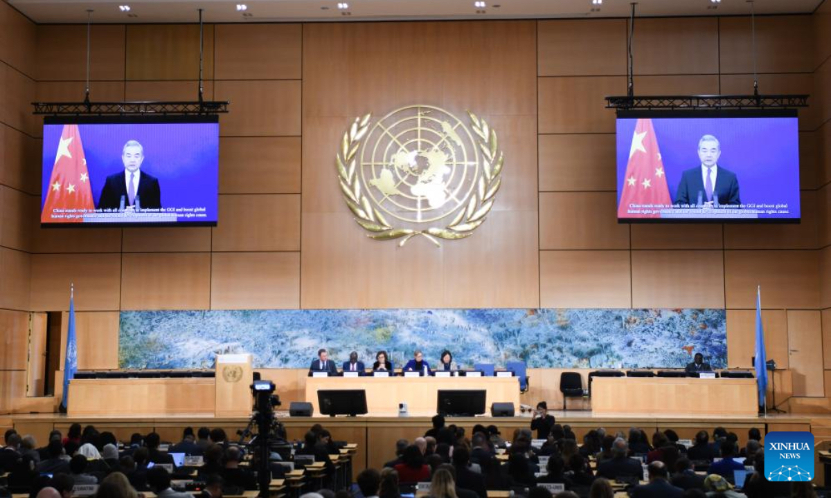 This photo taken on Feb. 23, 2026 shows Chinese Foreign Minister Wang Yi, also a member of the Political Bureau of the Communist Party of China Central Committee, giving a speech via video link at the high-level segment of the 61st session of the United Nations Human Rights Council in Geneva, Switzerland. (Xinhua/Lian Yi)