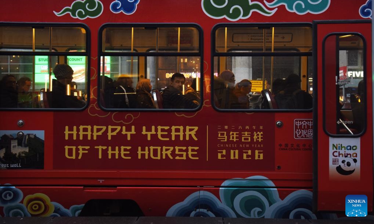 A tram decorated to celebrate the upcoming Chinese New Year is pictured in The Hague, the Netherlands, on Feb. 13, 2026. The tram has debuted on the busiest urban tram line in The Hague, bringing the festive spirit of the Chinese New Year to local residents. (Xinhua/Shao Haijun)

