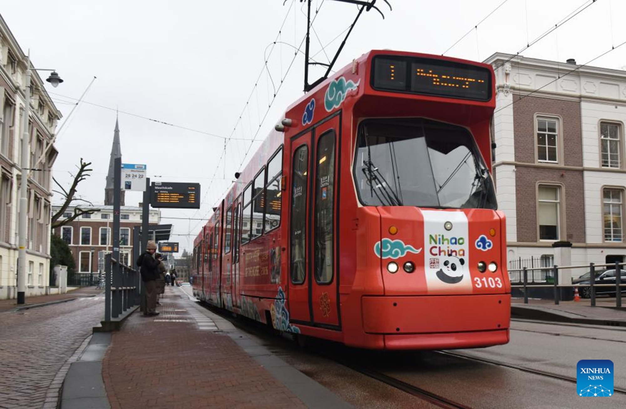 A tram decorated to celebrate the upcoming Chinese New Year is pictured in The Hague, the Netherlands, on Feb. 13, 2026. The tram has debuted on the busiest urban tram line in The Hague, bringing the festive spirit of the Chinese New Year to local residents. (Xinhua/Shao Haijun)

