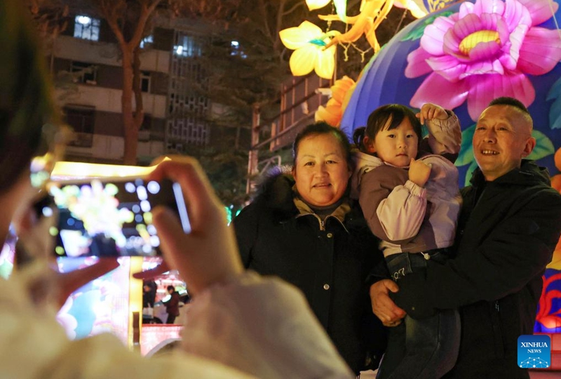 Tourists pose for photos during a lantern fair celebrating the upcoming Chinese New Year in Lanzhou, northwest China's Gansu Province, Feb. 14, 2026. (Xinhua/Chen Bin)