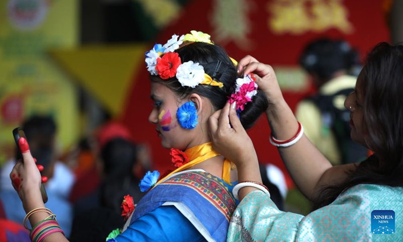 Women take part in the celebration of the Pahela Falgun festival in Dhaka, Bangladesh, Feb. 14, 2026. The first day on the eleventh month of the Bengali calendar marks the Pahela Falgun festival, during which people celebrate the beginning of the spring. (Photo by Habibur Rahman/Xinhua)