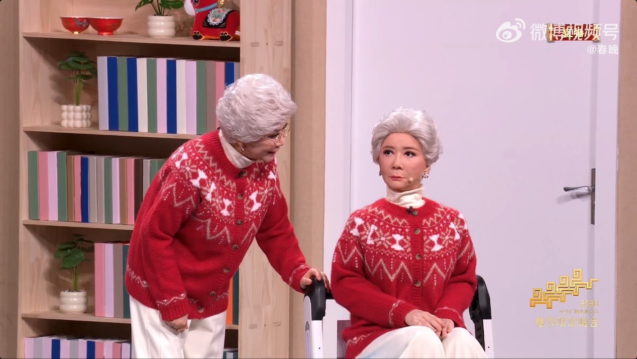 Noetix's bionic humanoid robot (right) mimicking Cai Ming's appearance at the short stage comedy 