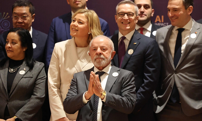 Brazil's President Luiz Inacio Lula da Silva (C) gestures as he prepares to pose for a group photo while attending the AI Impact Summit in New Delhi on February 19, 2026. Photo: CFP