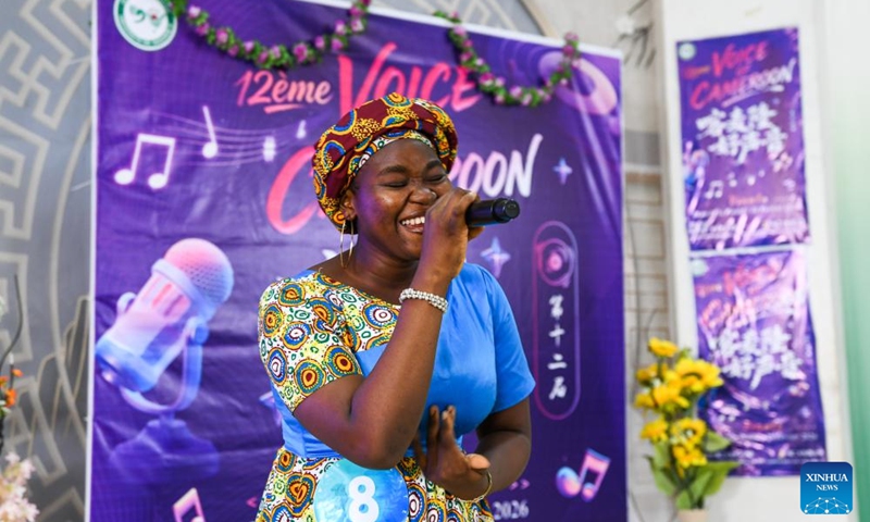 A participant sings a Chinese song in the final of the 12th edition of the Voice of Cameroon Chinese song competition at the University of Yaounde II in Soa, Cameroon, Feb. 20, 2026. (Xinhua/Kepseu)