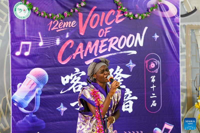 A participant sings a Chinese song in the final of the 12th edition of the Voice of Cameroon Chinese song competition at the University of Yaounde II in Soa, Cameroon, Feb. 20, 2026. (Xinhua/Kepseu)