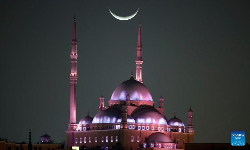 A crescent moon is seen over the Saladin Citadel on the second day of the holy month of Ramadan in Cairo, Egypt, Feb. 20, 2026. (Xinhua/Ahmed Gomaa)