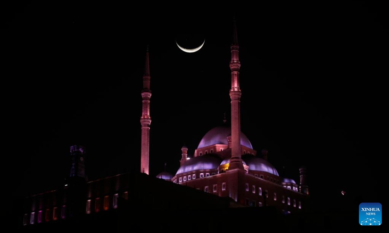 A crescent moon is seen over the Saladin Citadel on the second day of the holy month of Ramadan in Cairo, Egypt, Feb. 20, 2026. (Xinhua/Ahmed Gomaa)