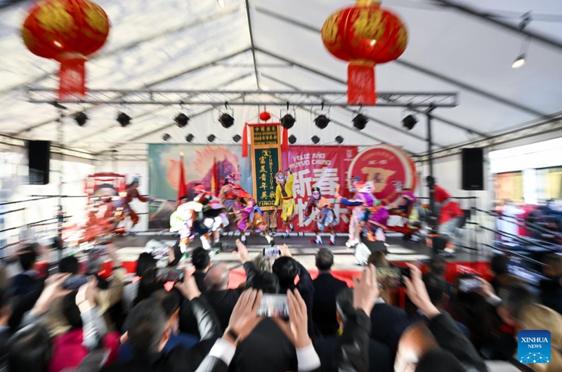 Yingge dancers from Guangdong Jieyang perform during a Spring Festival temple fair event in Madrid, Spain, Feb. 20, 2026. (Photo by Gustavo Valiente/Xinhua)