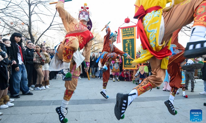 Yingge dancers from Guangdong Jieyang perform during a Spring Festival temple fair event in Madrid, Spain, Feb. 20, 2026. (Photo by Gustavo Valiente/Xinhua)