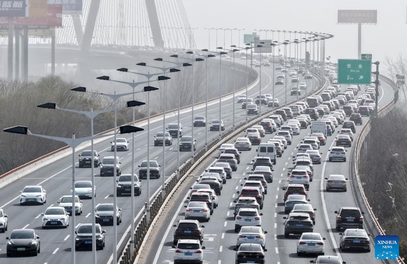 A drone photo taken on Feb. 22, 2026 shows vehicles on the Runyang Bridge, Yangzhou City, east China's Jiangsu Province. (Photo by Meng Delong/Xinhua)