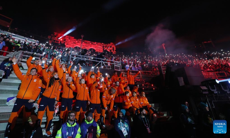 Members of the delegation of the Netherlands attend the closing ceremony of the Milan-Cortina 2026 Olympic Winter Games at Verona Olympic Arena in Verona, Italy, Feb. 22, 2026. (Xinhua/Li Ming)