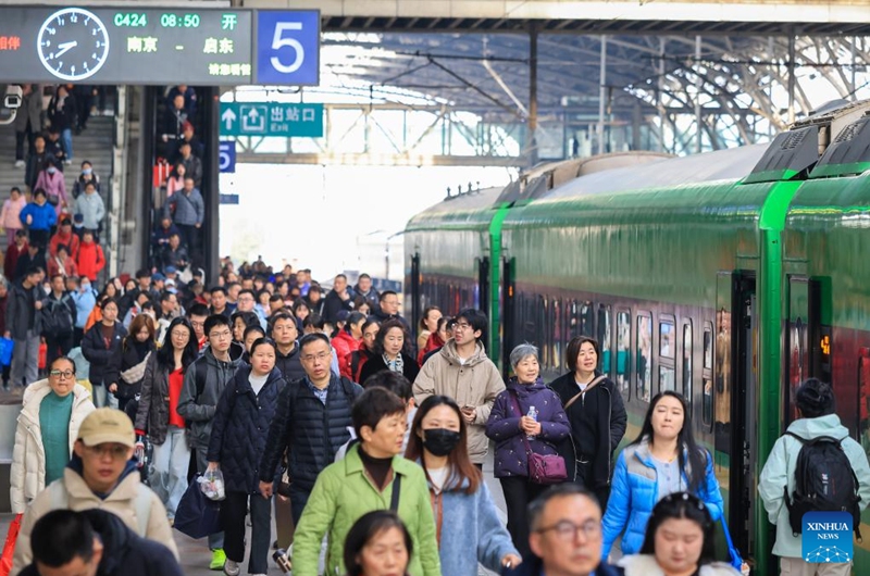 Passengers are pictured at a platform of Nanjing Railway Station in Nanjing, east China's Jiangsu Province, Feb. 19, 2026. (Photo by Su Yang/Xinhua)
