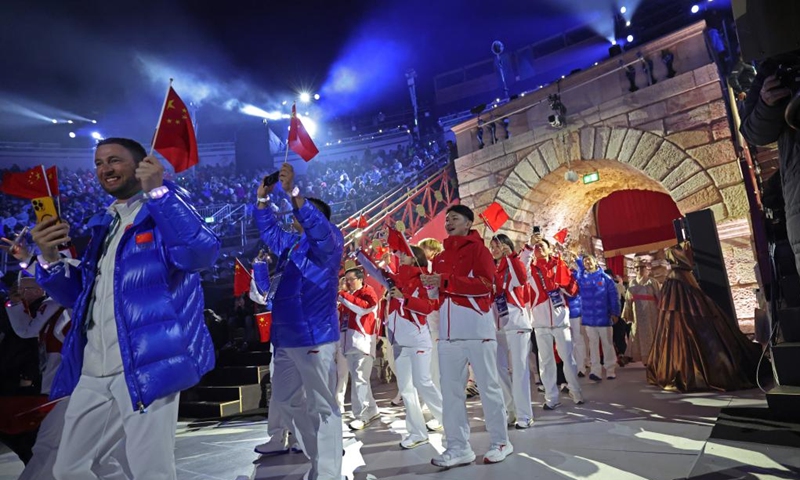 Members of the delegation of China parade during the closing ceremony of the Milan-Cortina 2026 Olympic Winter Games at Verona Olympic Arena in Verona, Italy, Feb. 22, 2026. (Xinhua/Li Ming)
