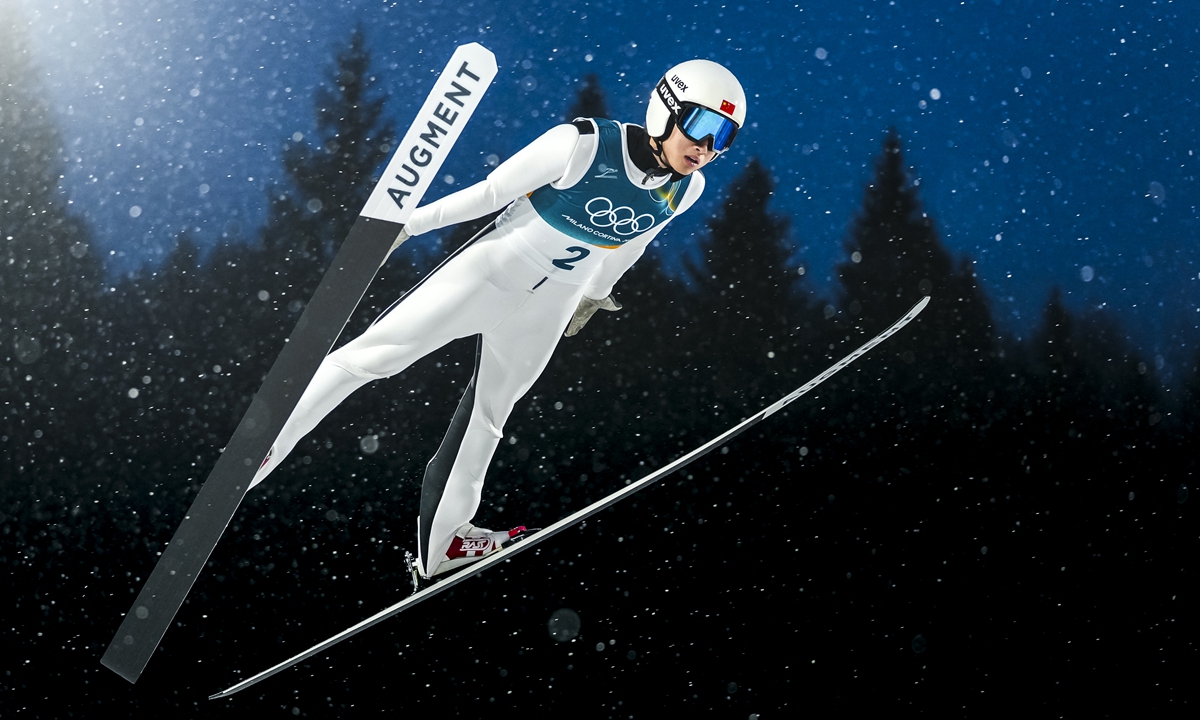 China's Song Qiwu competes during the Men's Large Hill Individual at the Games in Italy on February 14, 2026.