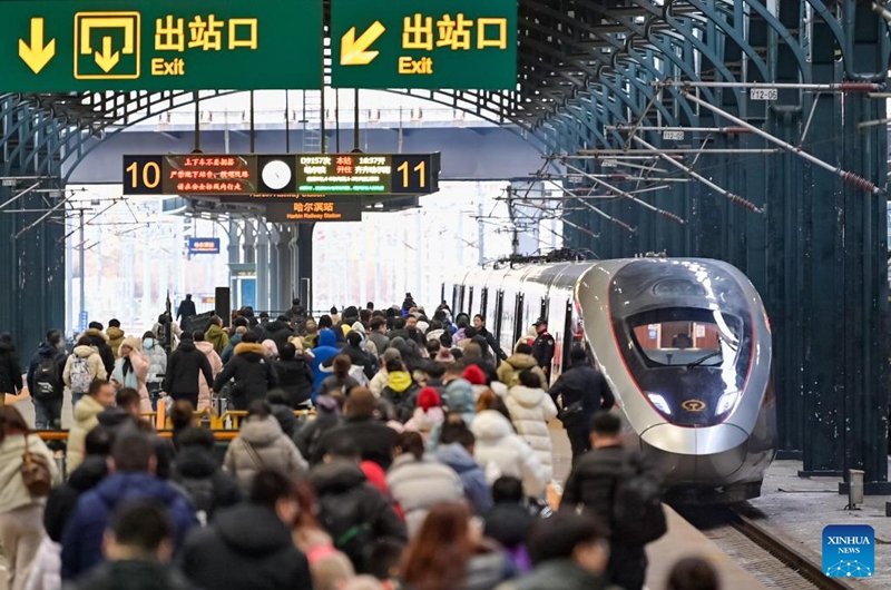 Passengers are pictured at a platform of Harbin Railway Station in Harbin, northeast China's Heilongjiang Province, Feb. 22, 2026. (Photo by Yuan Yong/Xinhua)