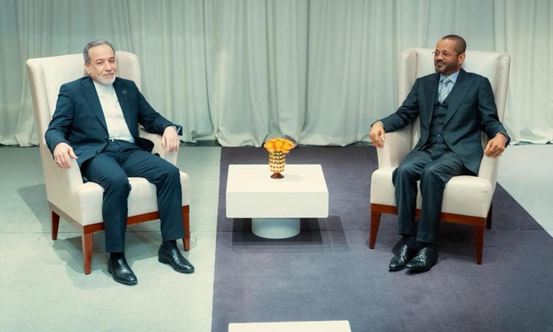 Omani Foreign Minister Sayyid Badr bin Hamad bin Hamood Albusaidi (R) meets with Iranian counterpart Seyed Abbas Araghchi in Geneva, Switzerland, Feb. 16, 2026. (Ministry of Information in Oman/Handout via Xinhua)