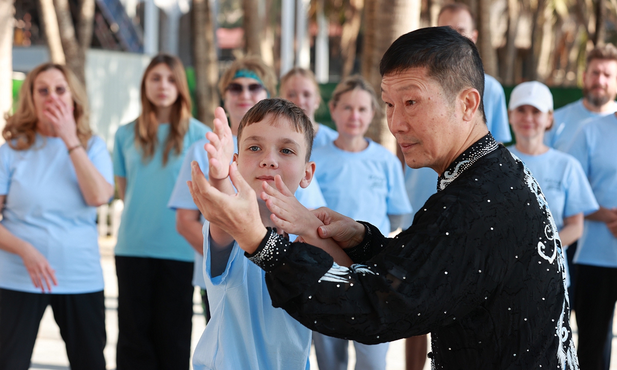 Foreigners from countries including Russia, Belarus, Spain, Cyprus and the US experience Tai Chi in Sanya on January 9, 2026. Photo: VCG