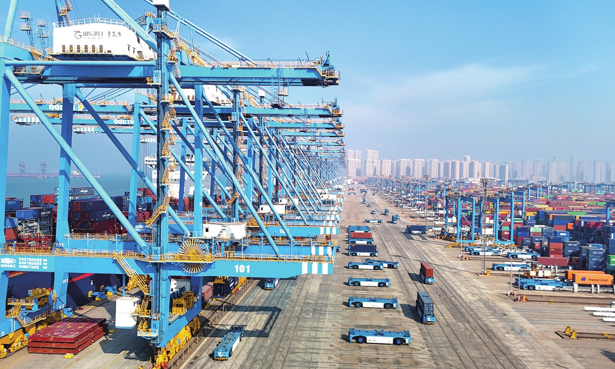 Automated guided vehicles are handling cargo at the fully automated terminal of Shandong Port Group's Qingdao Port, on February 4, 2026. Photo: VCG