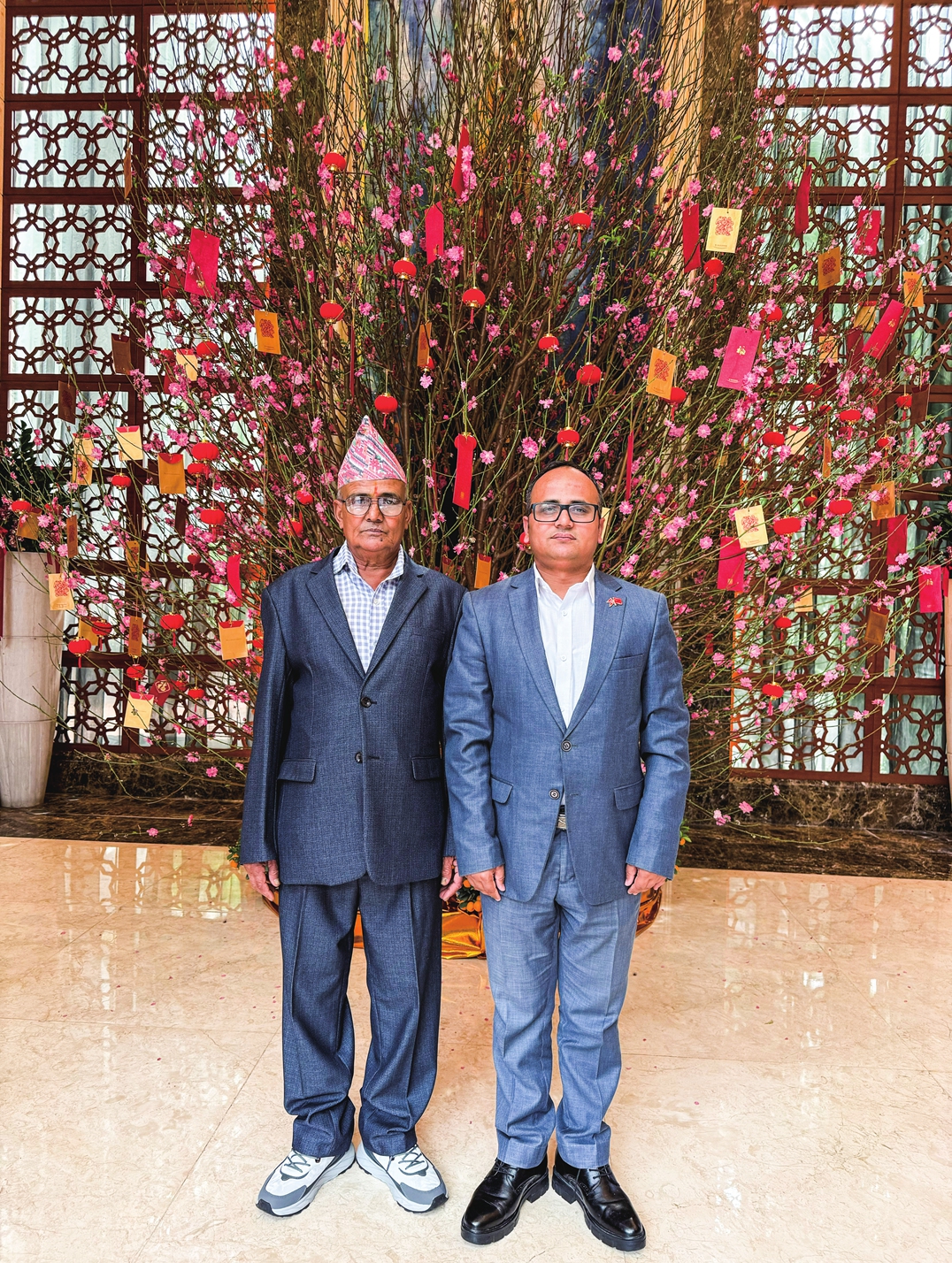 Consul General of the Consulate General of Nepal in Guangzhou Bharat Khanal (right) and his father in Guangzhou, Guangdong Province Photo: Courtesy of Bharat Khanal