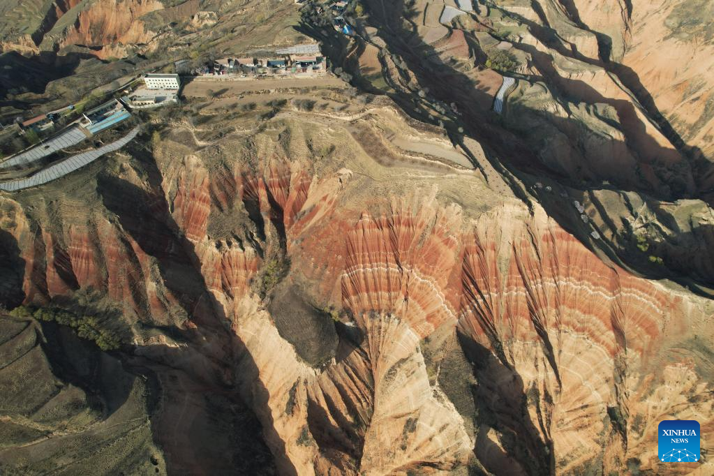 An aerial drone photo taken on April 3, 2026 shows a view of the Danxia Landform in Dongyuan Town of Dongxiang Autonomous County, Linxia Hui Autonomous Prefecture, northwest China's Gansu Province. (Xinhua/Zhang Zhimin)