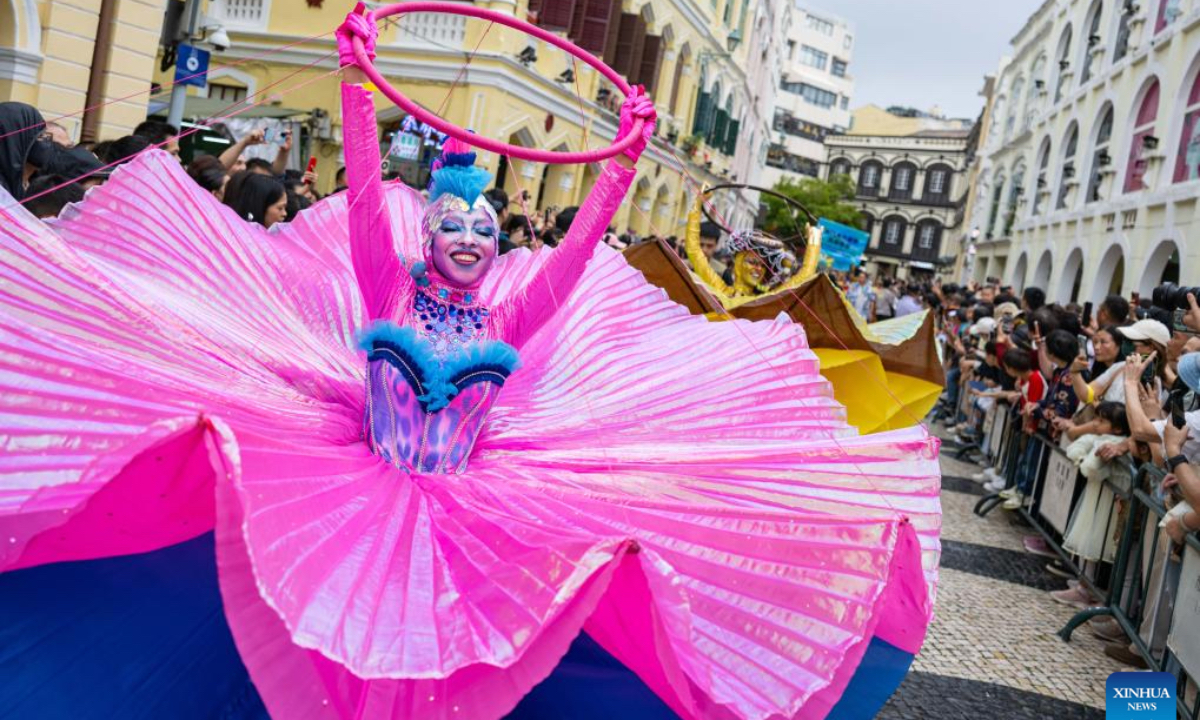 People participate in the 2026 Macao International Parade in Macao, south China, March 29, 2026. Art groups from different countries and regions presented diverse artistic performances, showcasing the unique appeal of Macao as a city featuring the integration of Chinese and Western cultures and creating a festive atmosphere for the Parade. (Xinhua/Cheong Kam Ka)