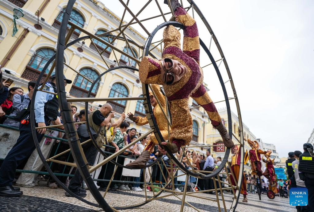 People participate in the 2026 Macao International Parade in Macao, south China, March 29, 2026. Art groups from different countries and regions presented diverse artistic performances, showcasing the unique appeal of Macao as a city featuring the integration of Chinese and Western cultures and creating a festive atmosphere for the Parade. (Xinhua/Cheong Kam Ka)
