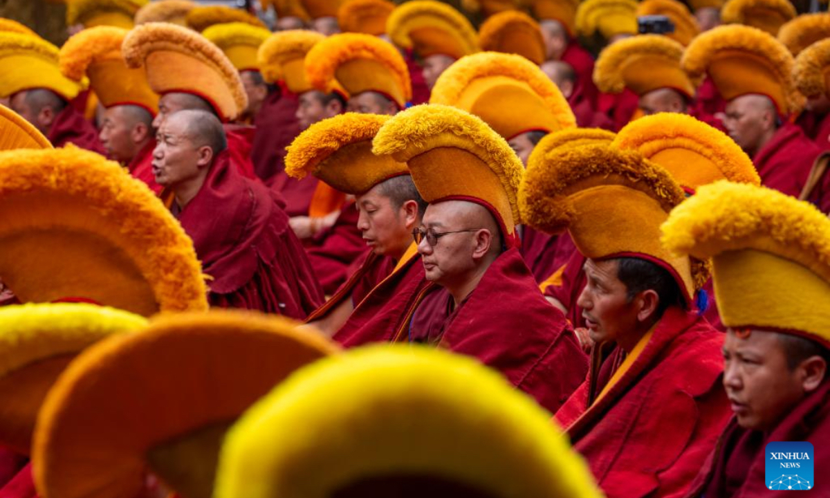 Monks attend a sutra debate and award ceremony conferring the title of Geshe Lharampa at the Jokhang Temple in Lhasa, southwest China's Xizang Autonomous Region, April 5, 2026. Thirteen monks obtained the degree of Geshe Lharampa following a sutra debate on Sunday in southwest China's Xizang Autonomous Region. Geshe Lharampa is the highest degree in the exoteric teachings of the Gelug school of Tibetan Buddhism, equivalent to a doctoral degree in modern education. (Xinhua/Tenzing Nima Qadhup)