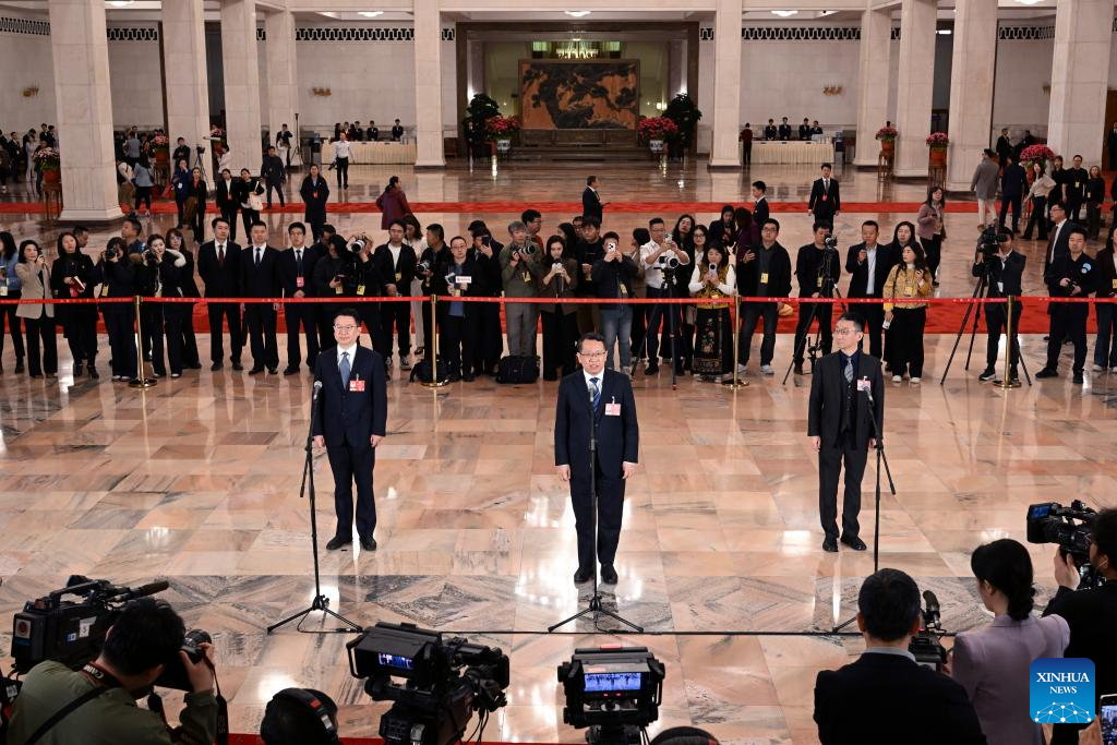 Members of the 14th National Committee of the Chinese People's Political Consultative Conference (CPPCC) attend a group interview ahead of the closing meeting of the fourth session of the 14th CPPCC National Committee at the Great Hall of the People in Beijing, capital of China, March 11, 2026. (Xinhua/Cao Yiming)