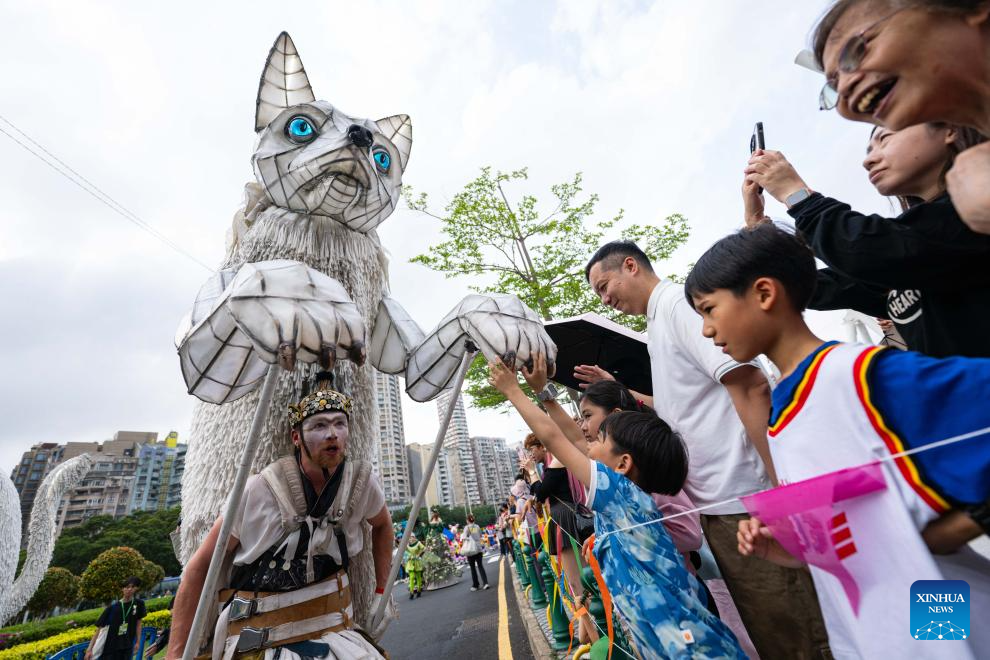 People participate in the 2026 Macao International Parade in Macao, south China, March 29, 2026. Art groups from different countries and regions presented diverse artistic performances, showcasing the unique appeal of Macao as a city featuring the integration of Chinese and Western cultures and creating a festive atmosphere for the Parade. (Xinhua/Cheong Kam Ka)