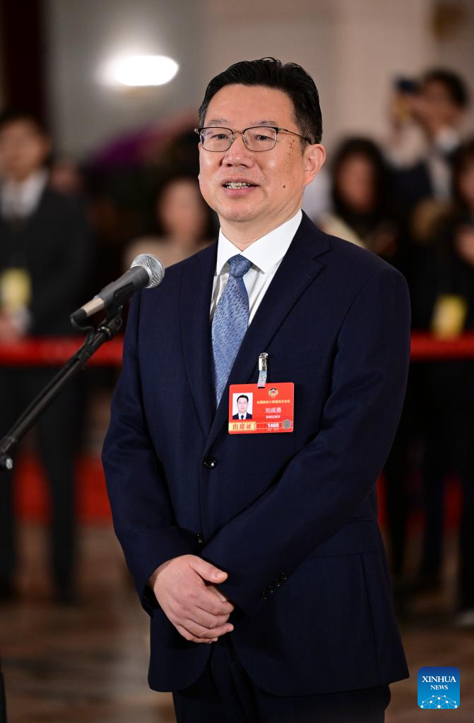 Liu Chengyong, a member of the 14th National Committee of the Chinese People's Political Consultative Conference (CPPCC), attends a group interview ahead of the closing meeting of the fourth session of the 14th CPPCC National Committee at the Great Hall of the People in Beijing, capital of China, March 11, 2026. (Xinhua/Chen Yehua)