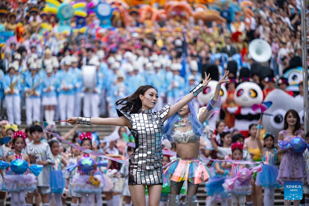 People participate in the 2026 Macao International Parade in Macao, south China, March 29, 2026. Art groups from different countries and regions presented diverse artistic performances, showcasing the unique appeal of Macao as a city featuring the integration of Chinese and Western cultures and creating a festive atmosphere for the Parade. (Xinhua/Cheong Kam Ka)