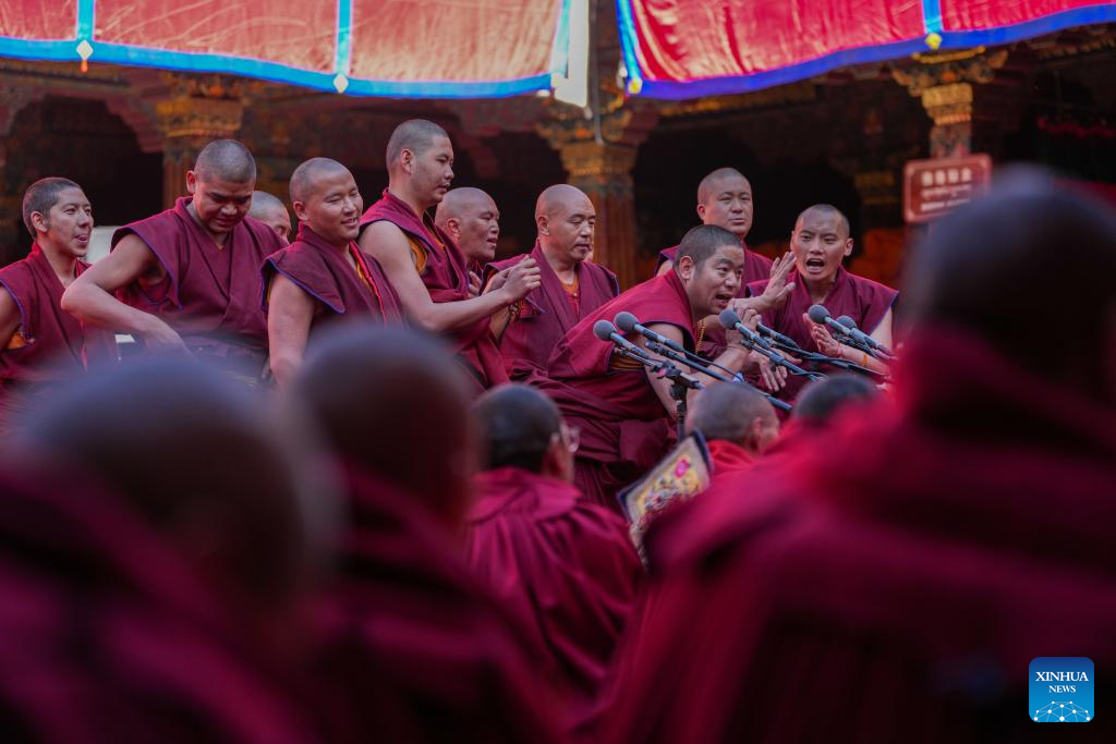 Monks attend a sutra debate and award ceremony conferring the title of Geshe Lharampa at the Jokhang Temple in Lhasa, southwest China's Xizang Autonomous Region, April 5, 2026. Thirteen monks obtained the degree of Geshe Lharampa following a sutra debate on Sunday in southwest China's Xizang Autonomous Region. Geshe Lharampa is the highest degree in the exoteric teachings of the Gelug school of Tibetan Buddhism, equivalent to a doctoral degree in modern education. (Xinhua/Jigme Dorje)