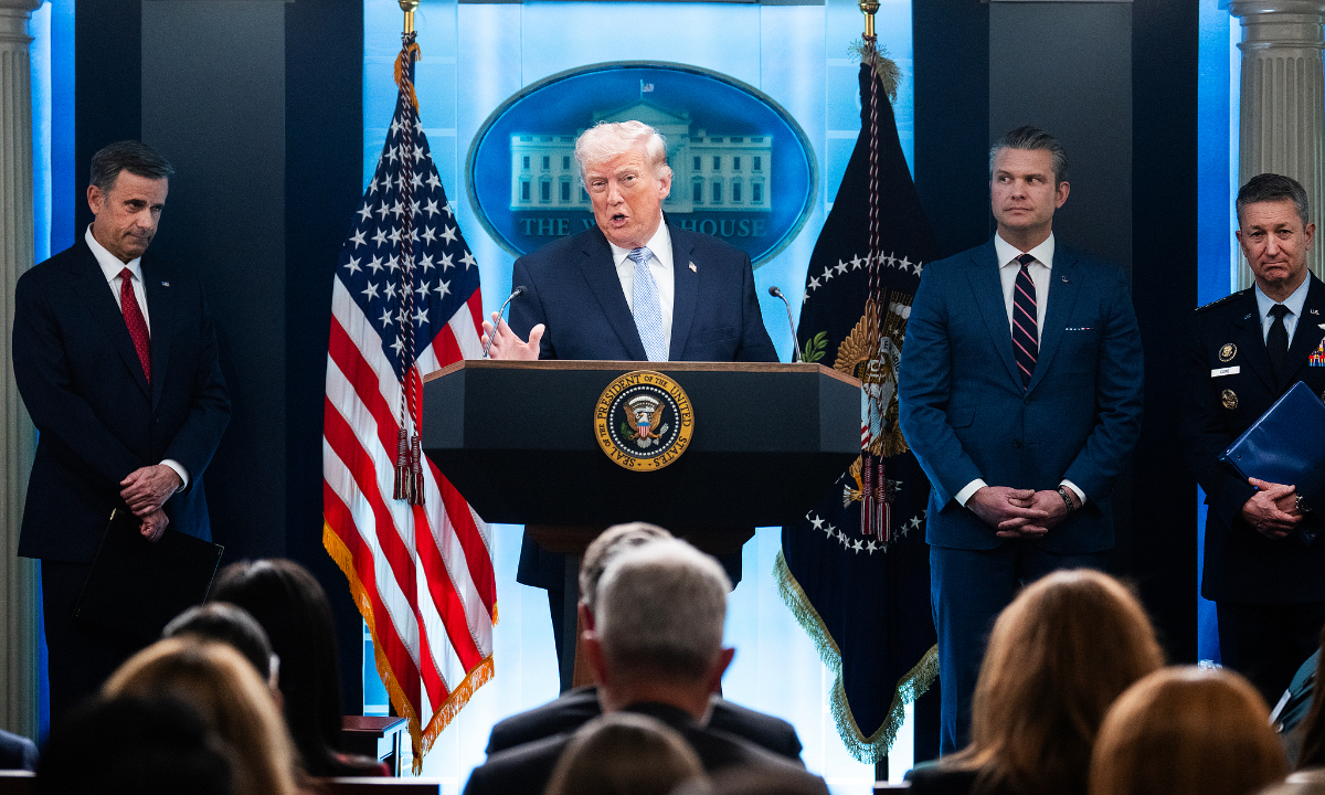 President Donald Trump, CIA Director John Ratcliffe, left, Defense Secretary Pete Hegseth, and Chairman of the Joint Chiefs of Staff Dan Caine, conduct a news conference in the White House briefing room about the war in Iran on Monday, April 6, 2026. Photo: VCG