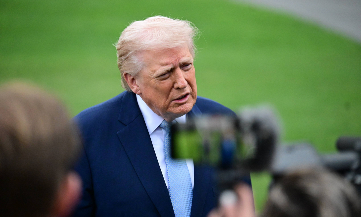 US President Donald Trump speaks to reporters on the Strait of Hormuz, Iran prior to departing on the South Lawn of the White House Washington DC, the US on March 20, 2026. Photo: VCG